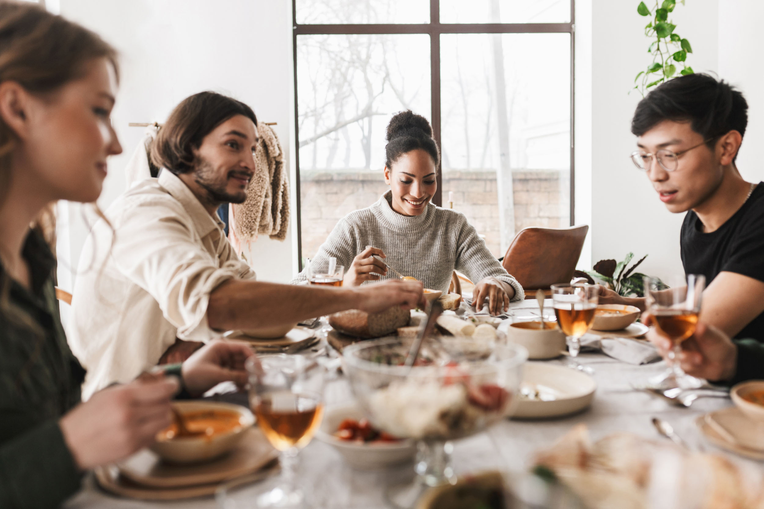 Group of friends having a meal together