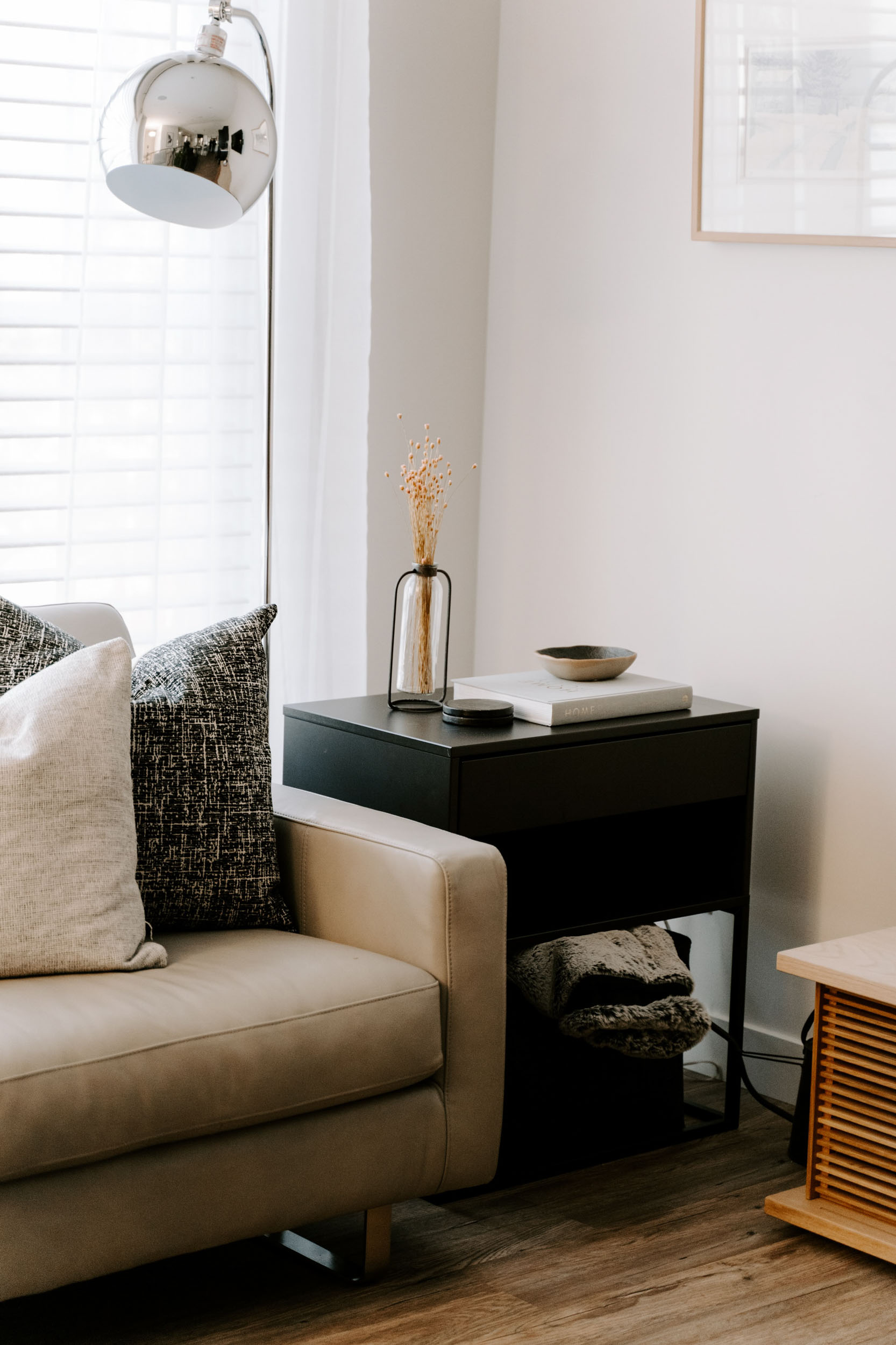 Stylish living room corner with couch lamp and side table