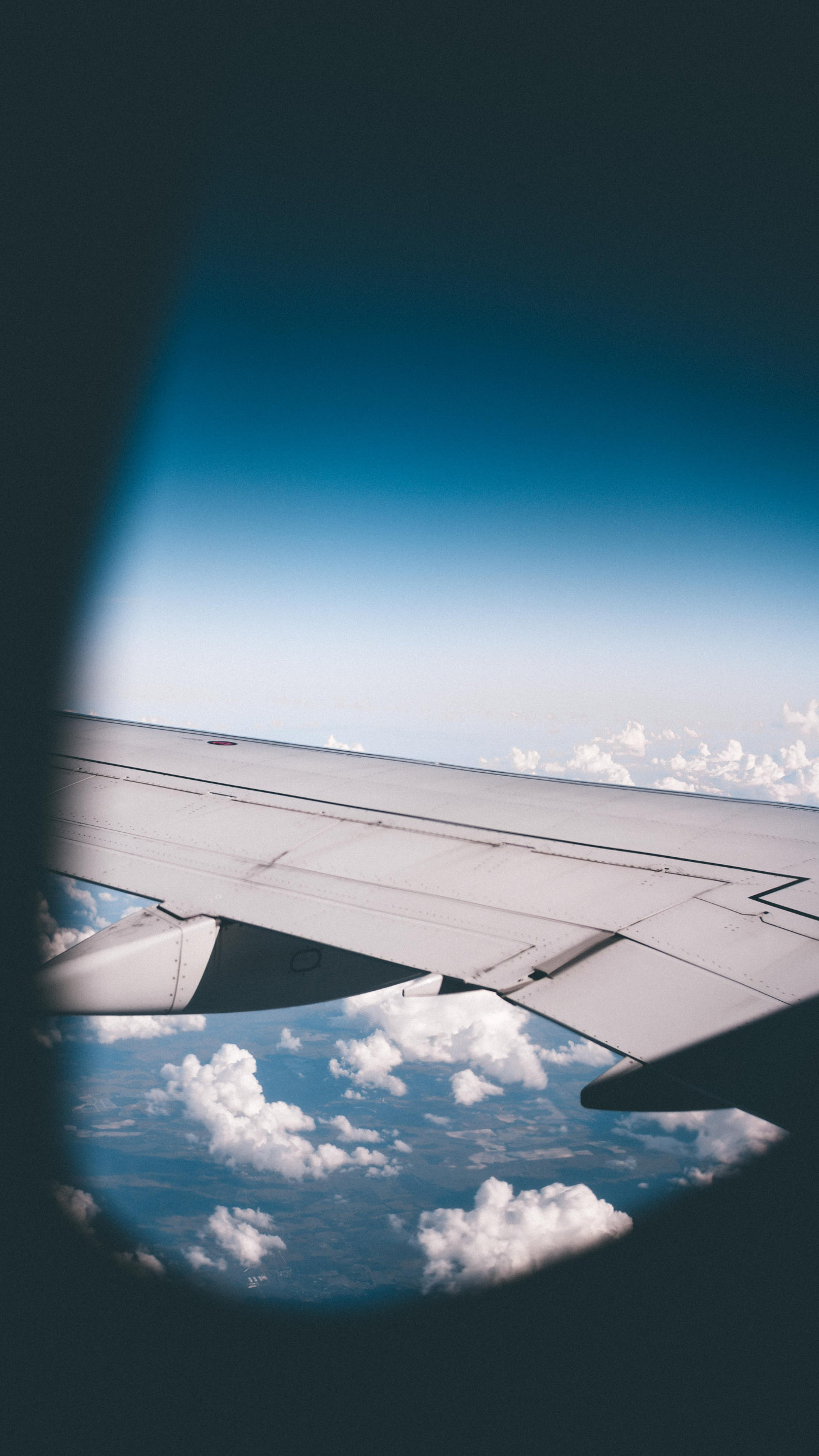 View of airplane wing out of window